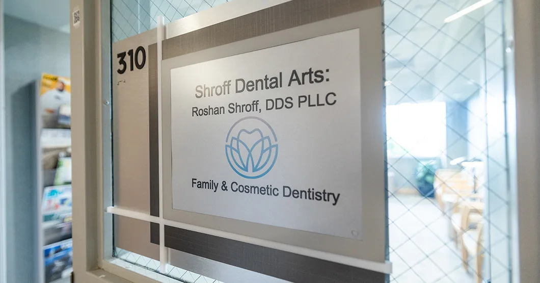 Glass entrance to Shroff Dental Arts, Suite 310